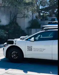 driverless robocar, white, external cameras, Waymo