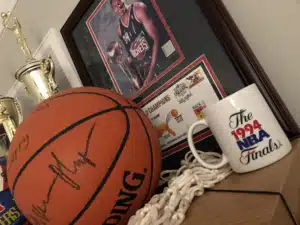 autographed basketball, net, 1994 NBA Finals cup, 94-95 championship display with Hakeem Olajuwon